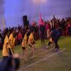 Players of the Pink Panther team playing kabaddi with the University students